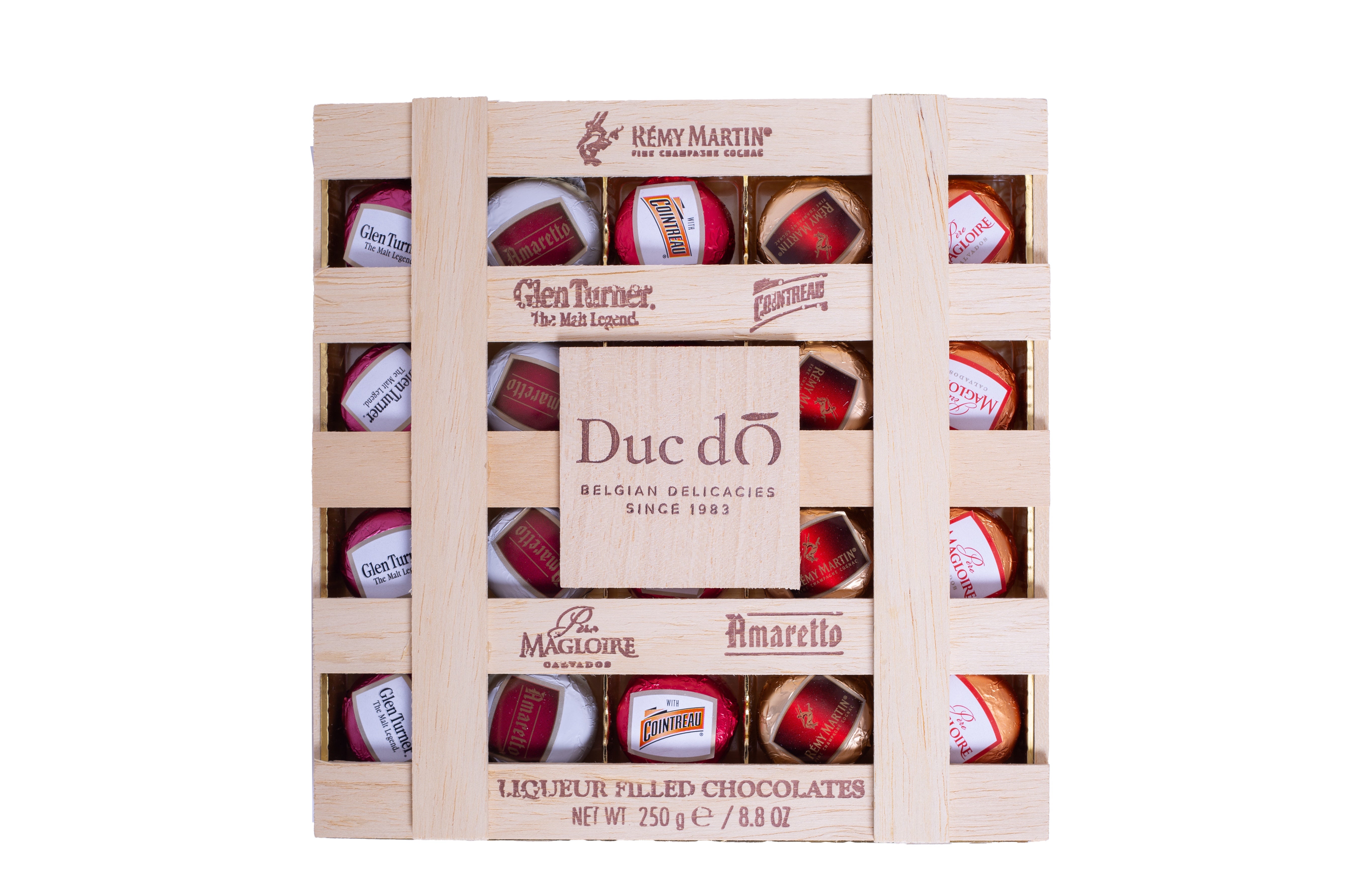 Box of Duc d'O liqueur-filled chocolates with Remy Martin branding on a white background