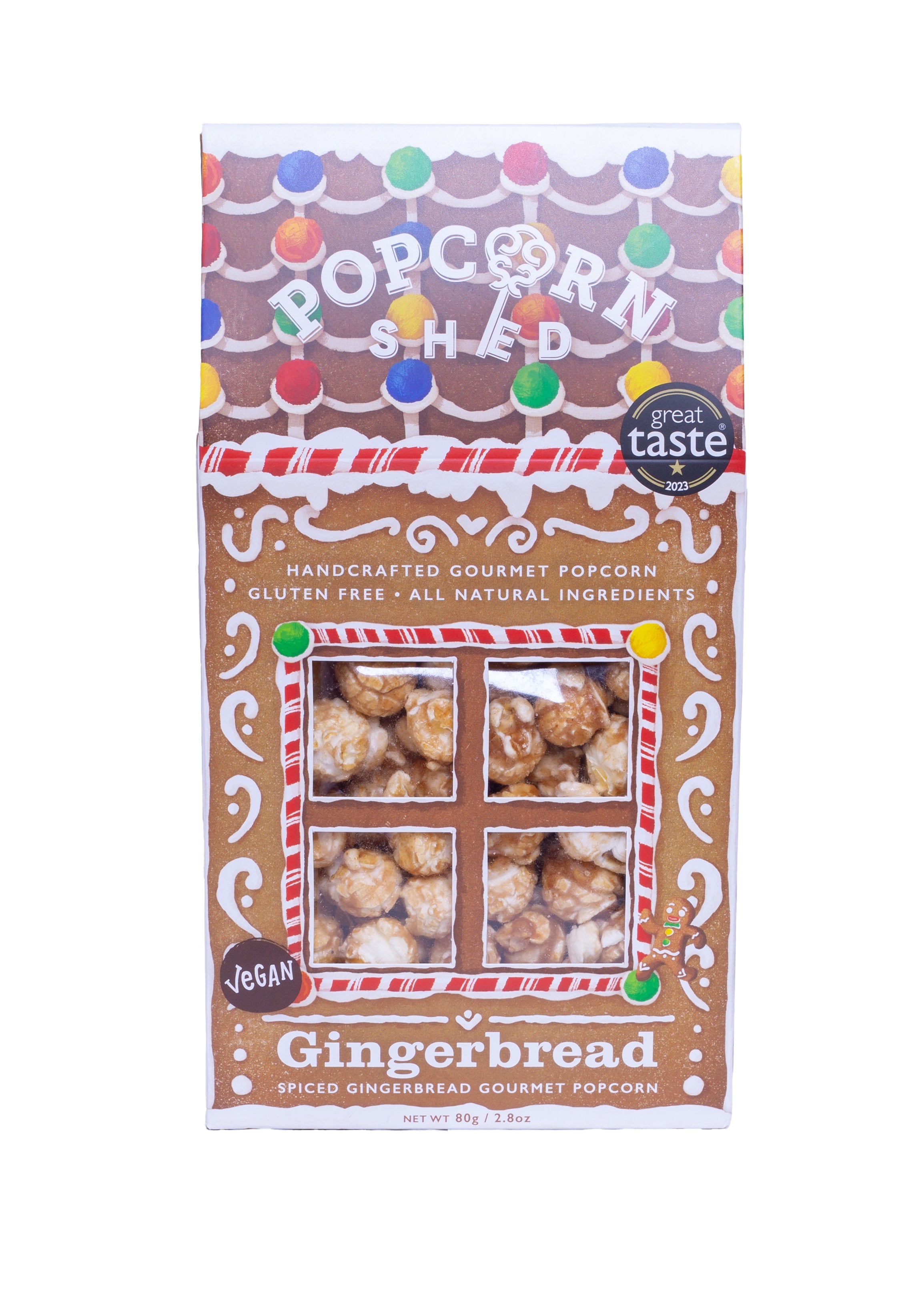 Gingerbread flavored popcorn packaging with 'Popcorn Shed' branding on a white background